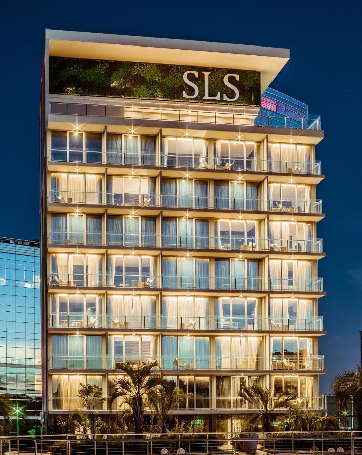 Sls Buenos Aires Puerto Madero Hotel ภายนอก รูปภาพ The hotel at night