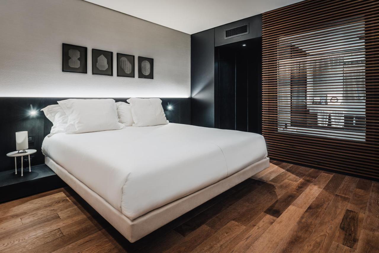 Sls Buenos Aires Puerto Madero Hotel ภายนอก รูปภาพ A bedroom at the hotel