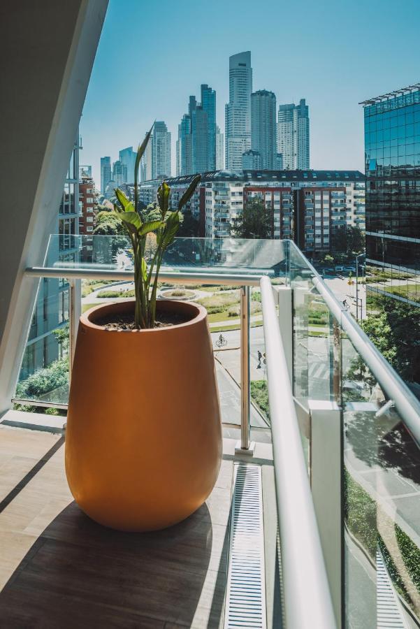 Sls Buenos Aires Puerto Madero Hotel ภายนอก รูปภาพ A planter in a building